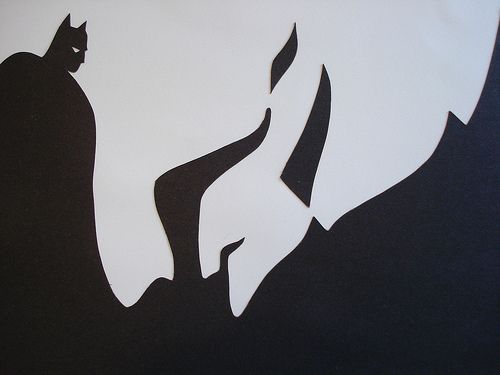 An example of negative space featuring Batman and the Joker - this helps demonstrate ways of creating innovative marketing strategies by leveraging your negative space. 